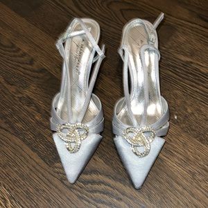 A. Marinelli. Silver kitten heels with pearl detail. Closed toe. size 6.5.